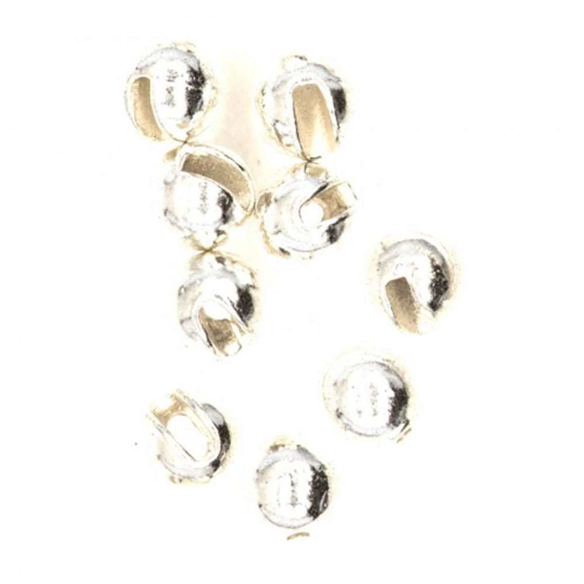Gold and silver beads on a white background